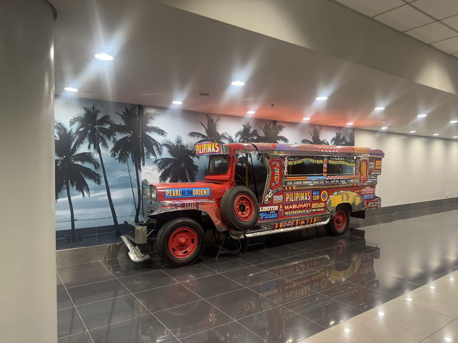 A jeepney on display inside the airport